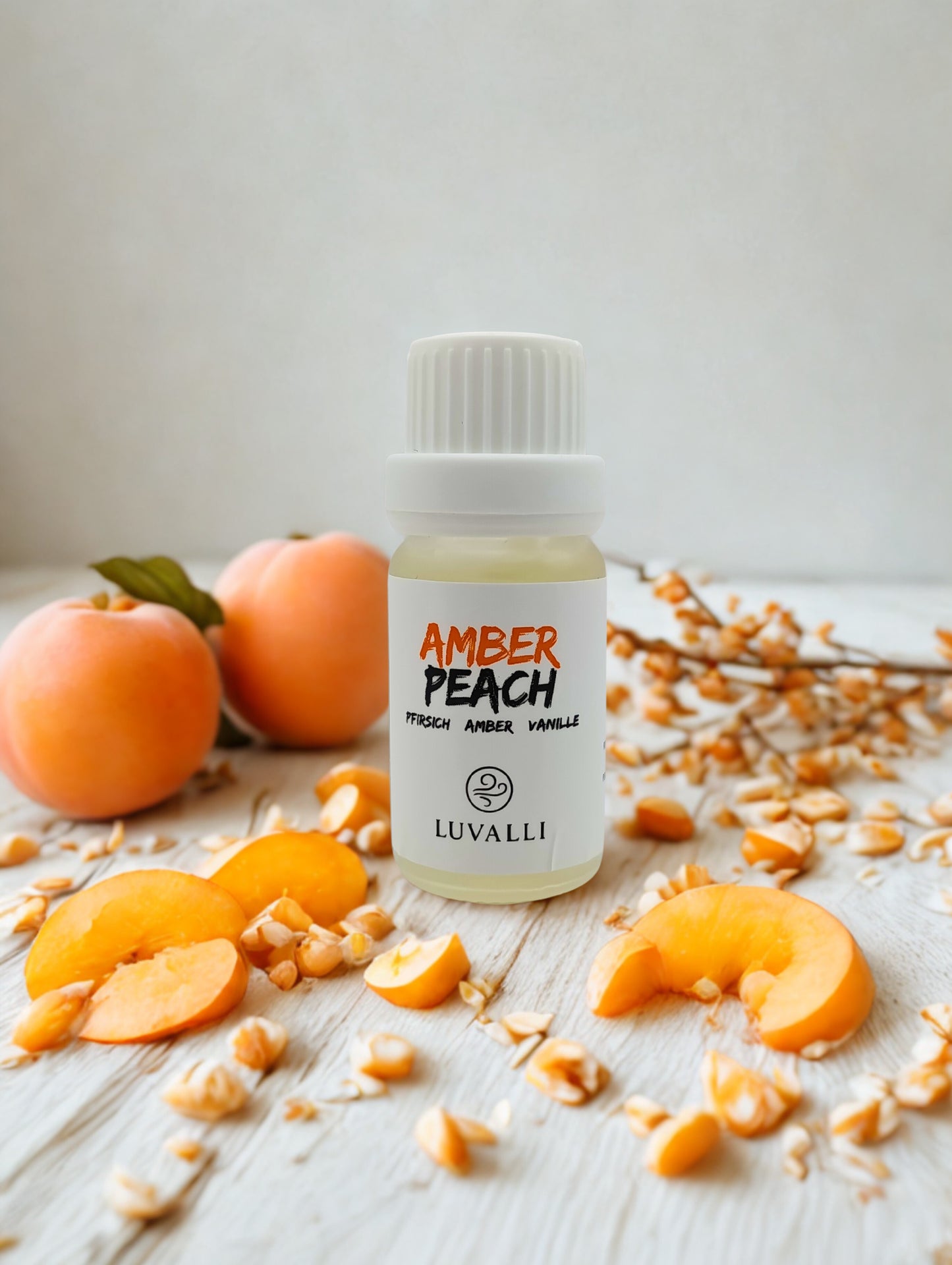 Amber Peach Aromaöl mit passendem Hintergrund